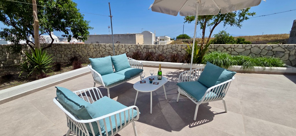 Terrace seating with a view toward the village