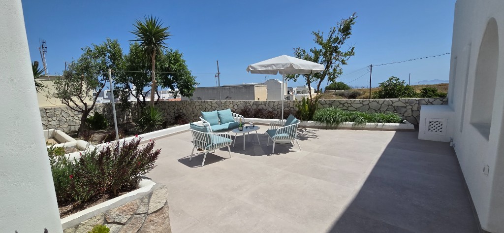 Quiet terrace seating at Pension Atlas