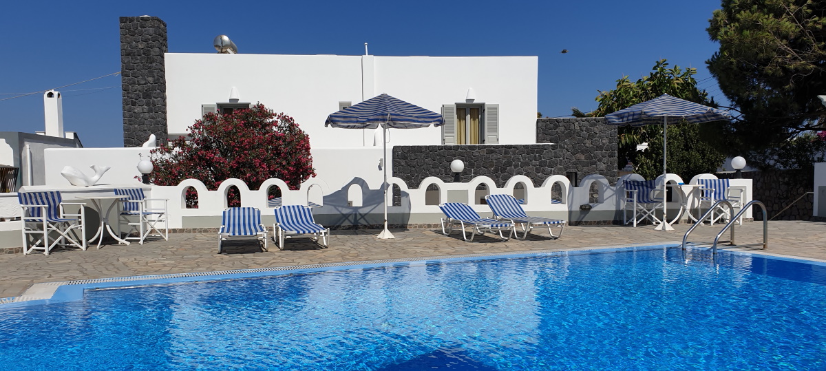 Our pool and terrace with the house behind